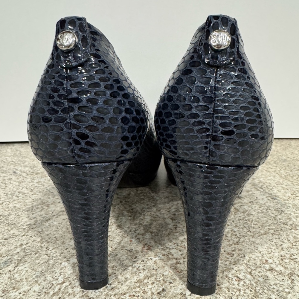 Blue metallic snake skin peep toe Stuart Weitzman platform.